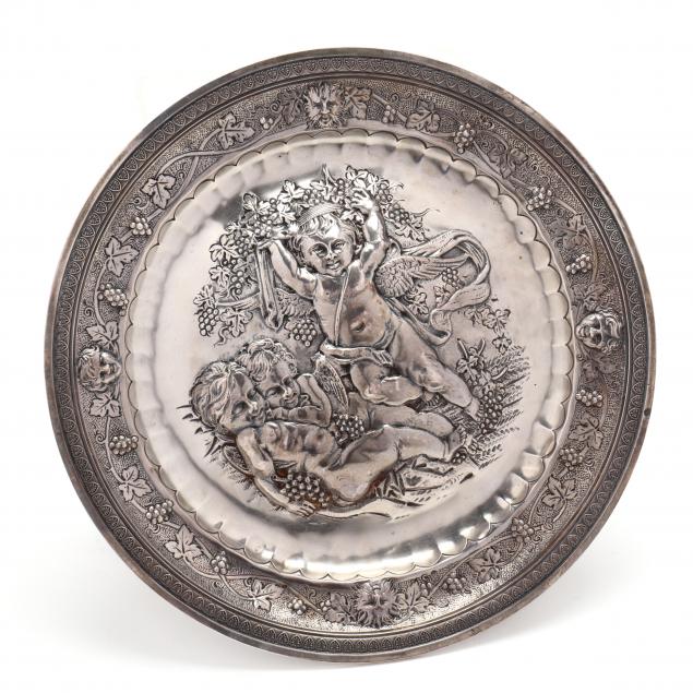 a-french-silver-repousse-footed-round-tray