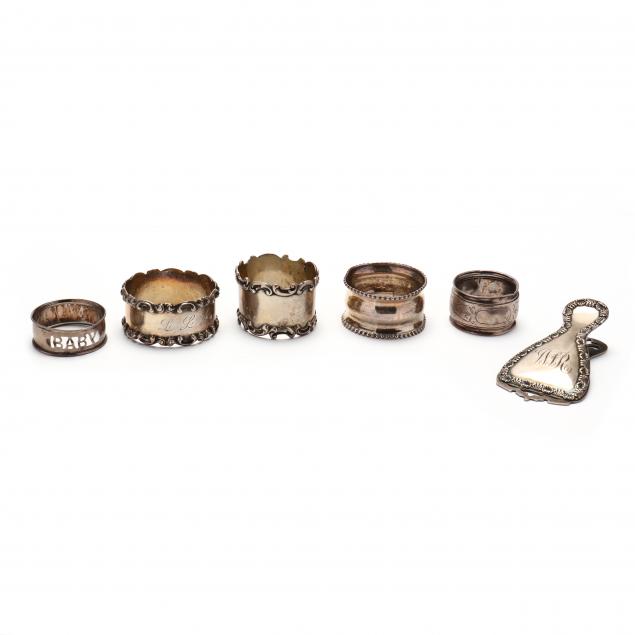 five-sterling-silver-napkin-rings-and-a-large-desk-clip