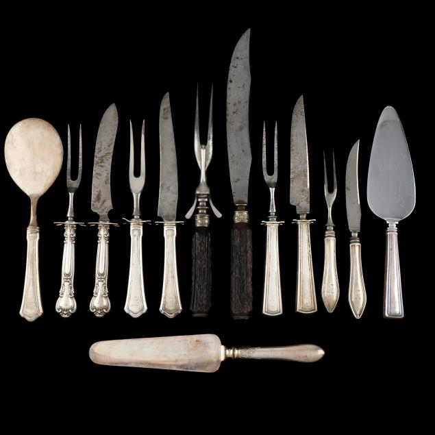 collection-of-sterling-handled-servers