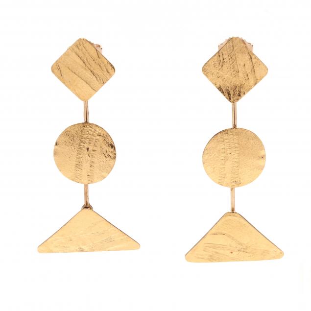pair-of-gold-dangle-earrings