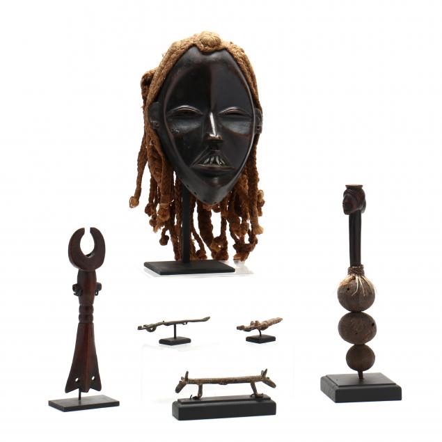six-west-african-decorative-works-on-custom-stands