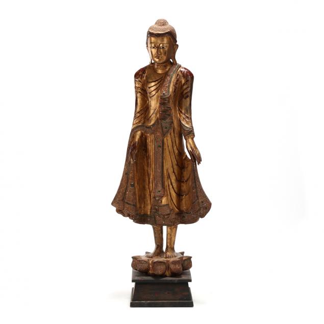 a-burmese-gilt-and-lacquered-standing-buddha