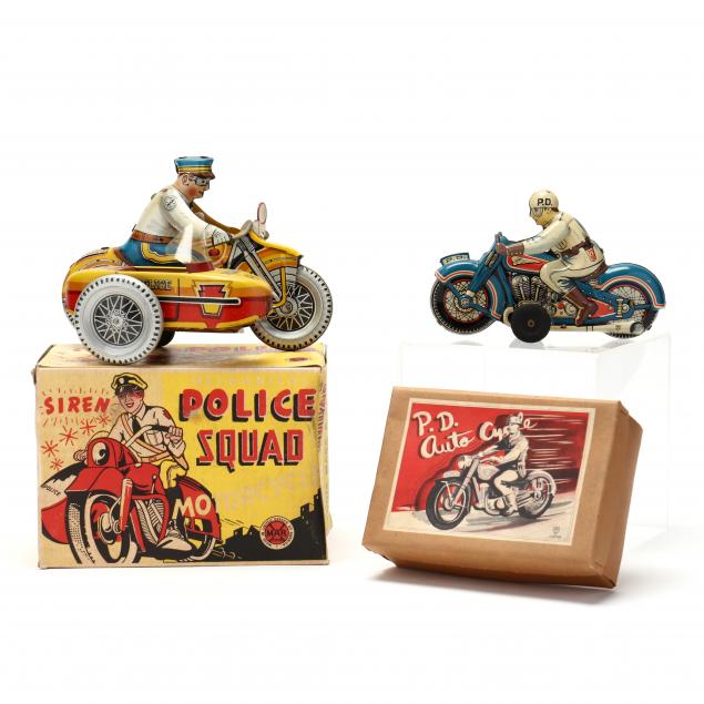 two-vintage-boxed-police-cycle-toys