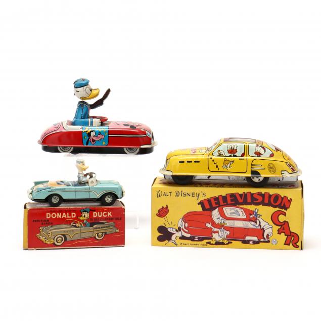 three-walt-disney-cars-with-donald-at-the-wheel