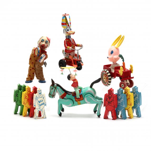 a-selection-of-five-clown-and-circus-related-toys