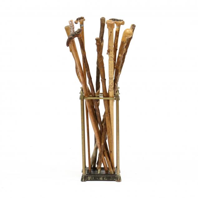 ten-folk-art-walking-sticks-and-cane-stand