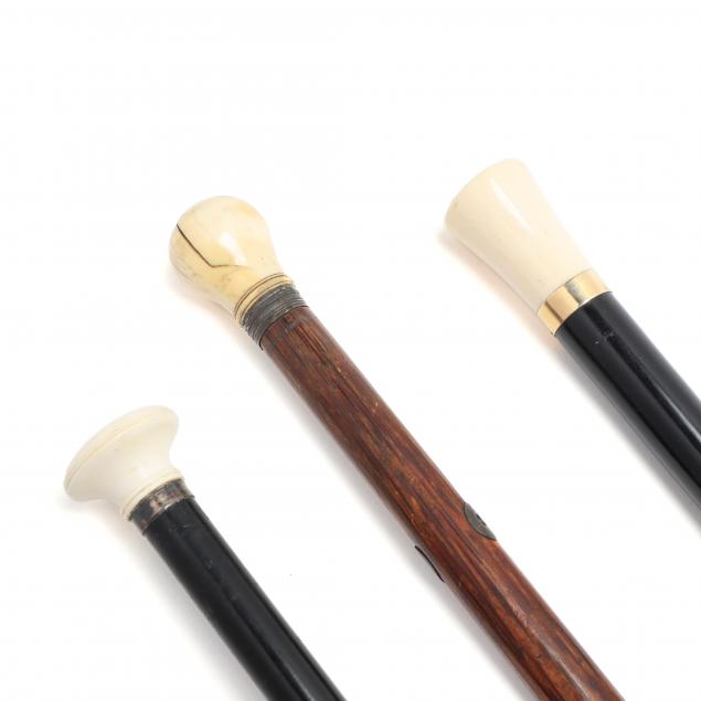 three-vintage-natural-handled-walking-sticks