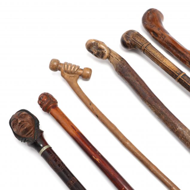 six-carved-folk-art-walking-sticks