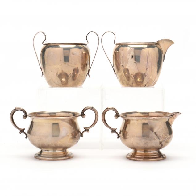 two-pairs-of-sterling-silver-creamer-and-sugars
