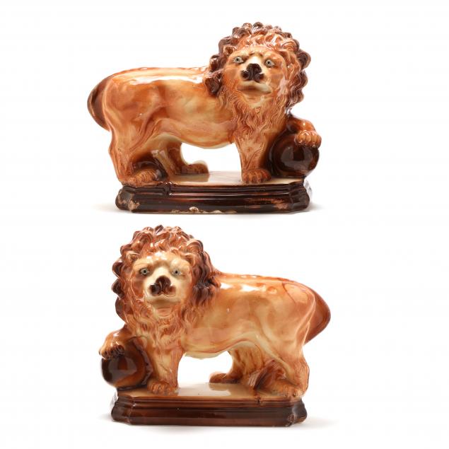 pair-of-staffordshire-pottery-facing-lions