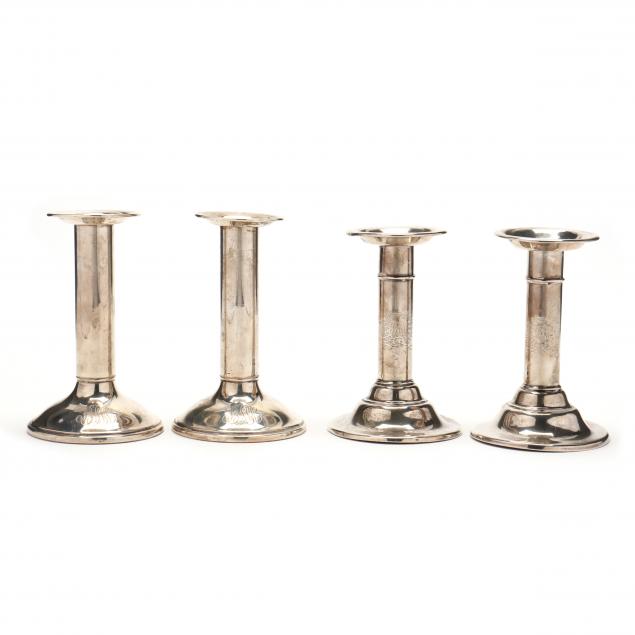 two-pairs-of-sterling-silver-candlesticks