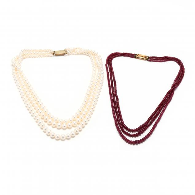 a-triple-strand-pearl-necklace-and-a-ruby-bead-necklace