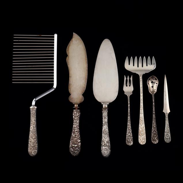 a-grouping-of-repousse-sterling-silver-flatware
