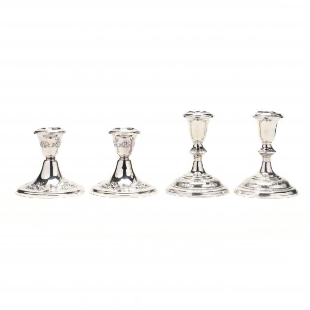 two-pairs-of-sterling-silver-candlesticks