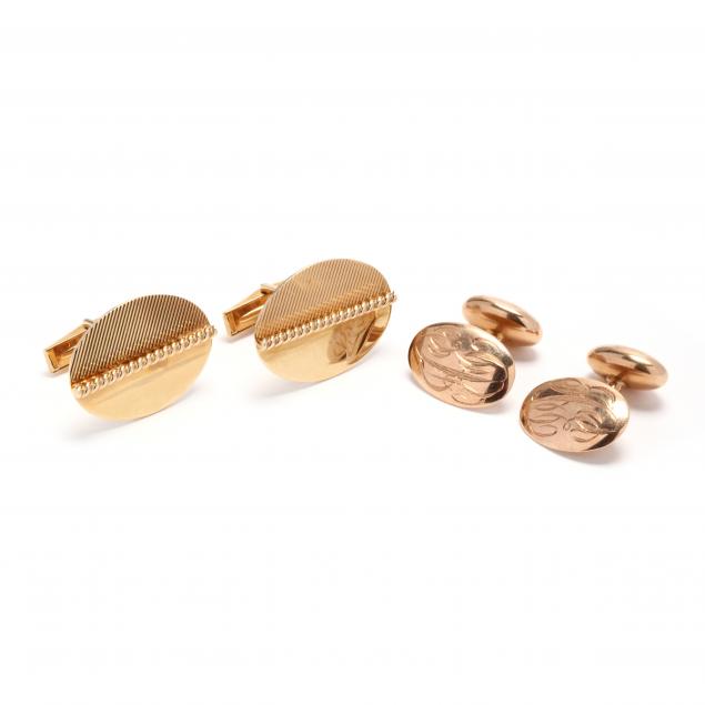 two-pairs-of-gold-cufflinks