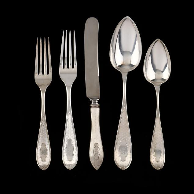 an-assembled-set-of-coin-and-sterling-silver-flatware