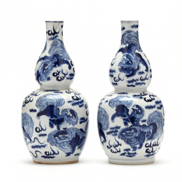 a-pair-of-chinese-porcelain-blue-and-white-foo-lion-vases