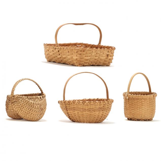a-group-of-four-contemporary-baskets