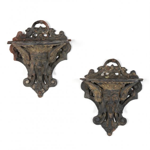pair-of-figural-mask-cast-iron-wall-brackets