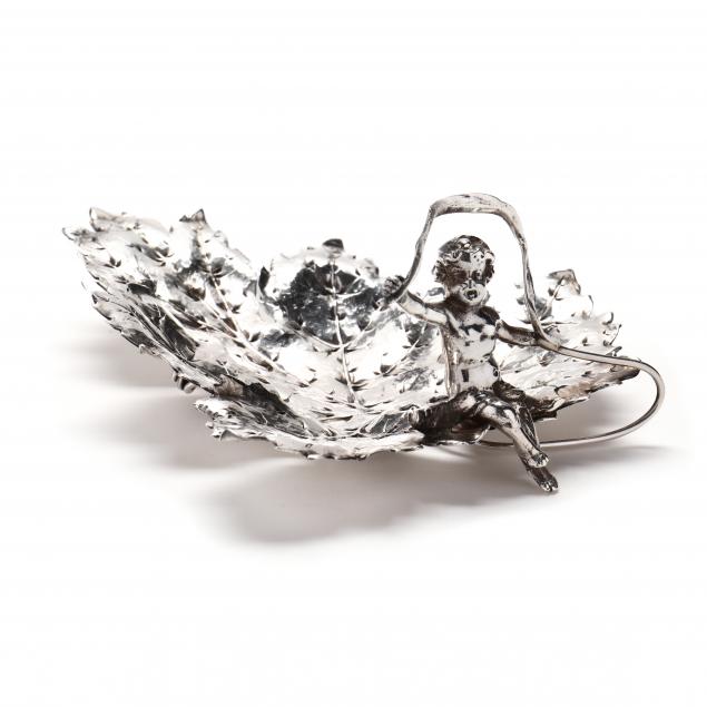 a-german-silver-leaf-form-dish-with-putto-handle