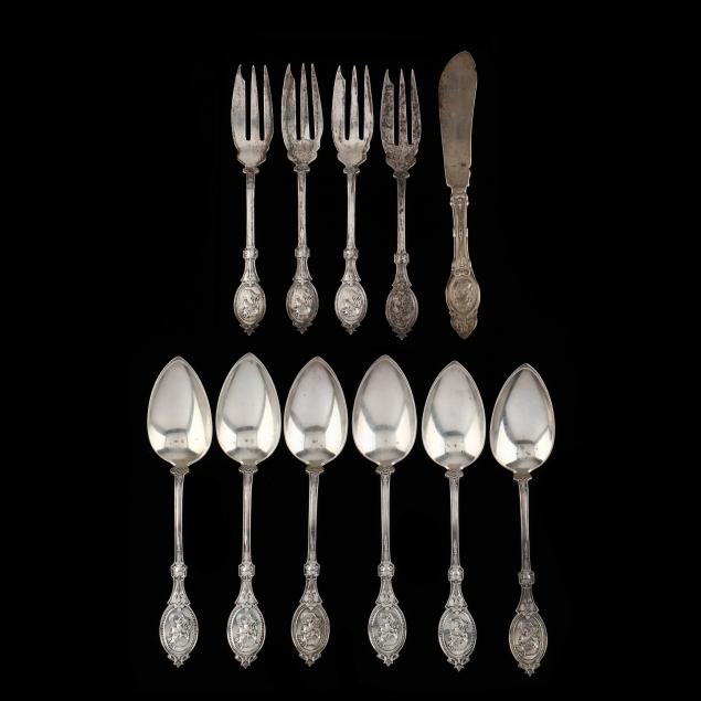 a-grouping-of-antique-sterling-silver-medallion-flatware