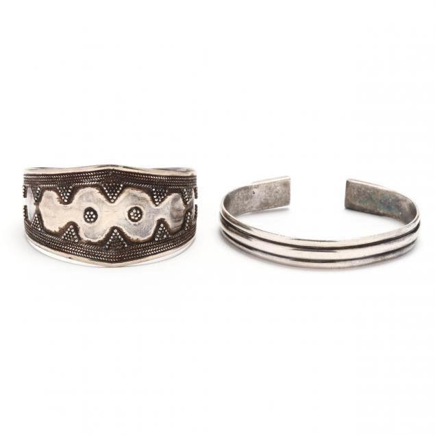 two-silver-cuff-bracelets
