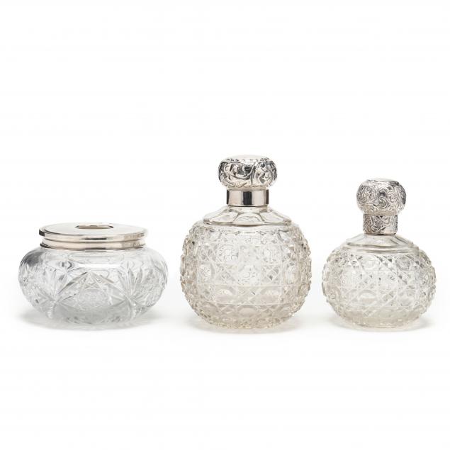 three-silver-lidded-cut-glass-vanity-jars