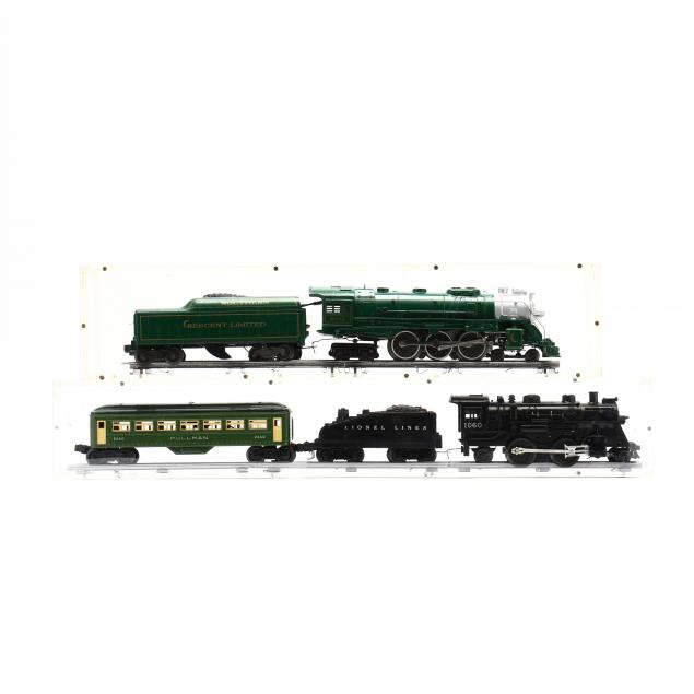 two-train-segments-within-plexiglass-cases