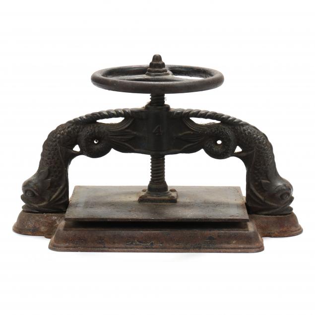 antique-cast-iron-dolphin-book-press