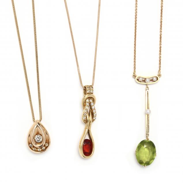 three-gold-and-gem-set-necklaces