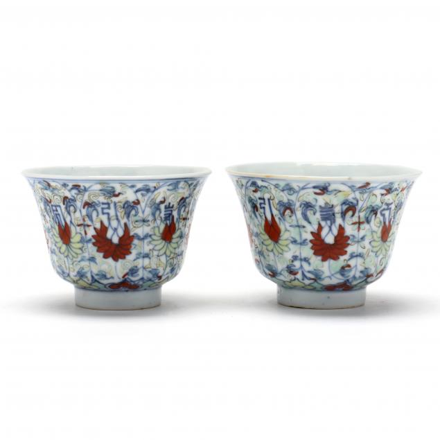 a-pair-of-chinese-porcelain-wucai-tea-bowls-with-tibetan-symbols
