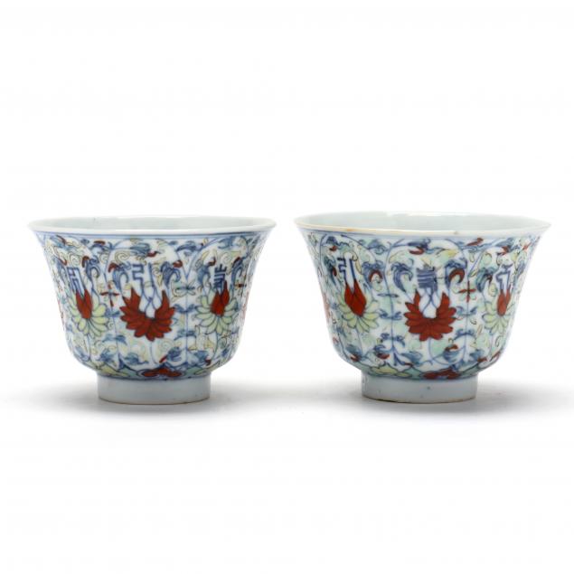 a-pair-of-chinese-porcelain-wucai-tea-bowls-with-tibetan-symbols
