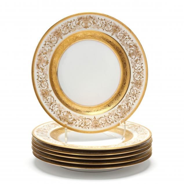 a-set-of-six-gilt-encrusted-dinner-plates
