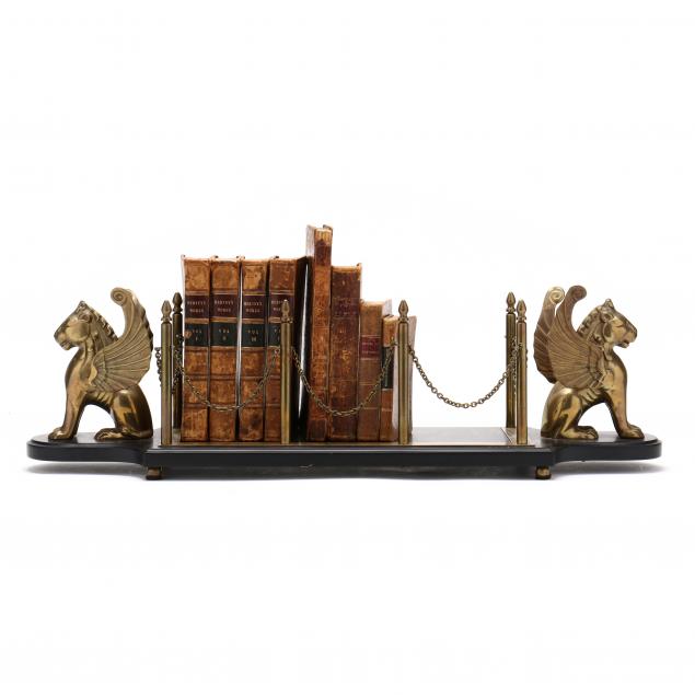 figural-stand-with-eight-antique-leatherbound-books
