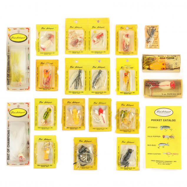 collection-of-twenty-fred-arbogast-lures-in-original-packaging