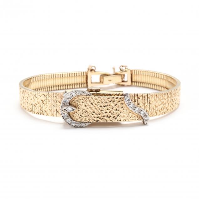 vintage-gold-and-diamond-covered-bracelet-watch