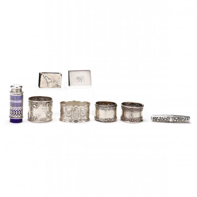 a-grouping-of-eight-sterling-silver-table-accessories