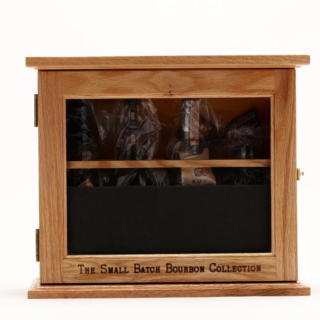 small-batch-bourbon-collection-in-wooden-display-case