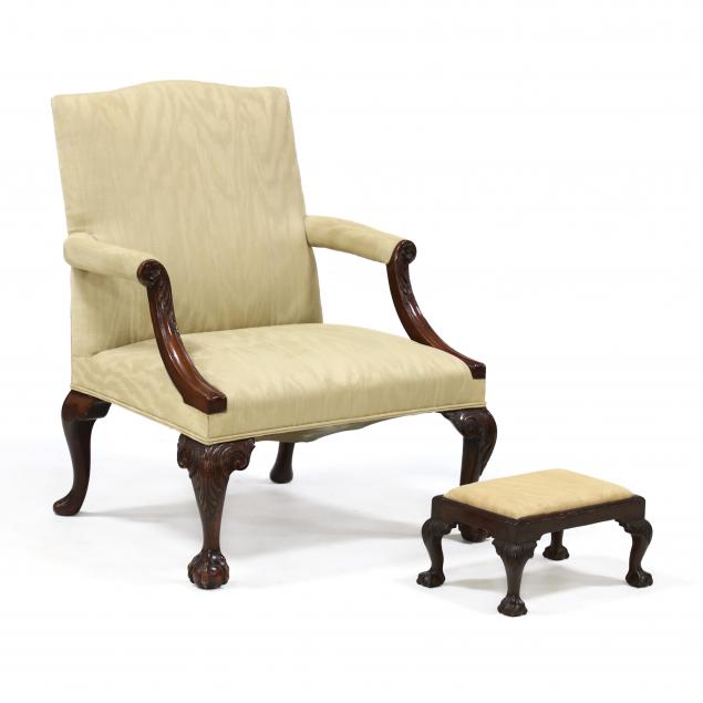 chippendale-style-carved-mahogany-lolling-chair-and-footstool