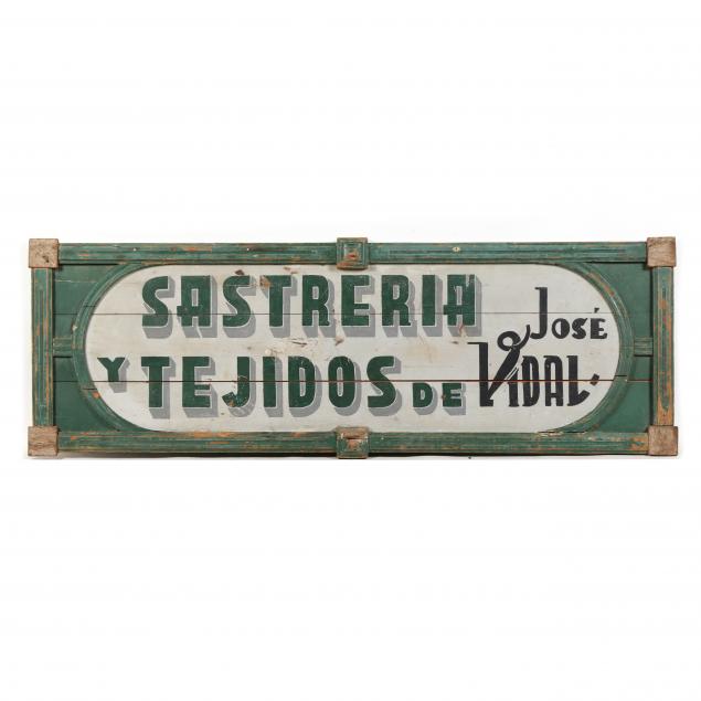 vintage-spanish-painted-wood-trade-sign-for-a-seamster