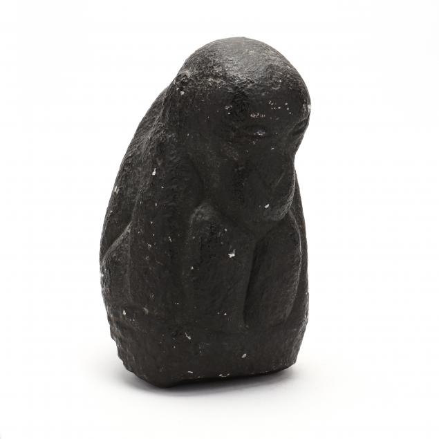 stone-sculpture-of-a-primate