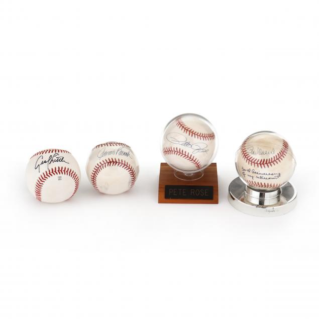 four-signed-baseballs