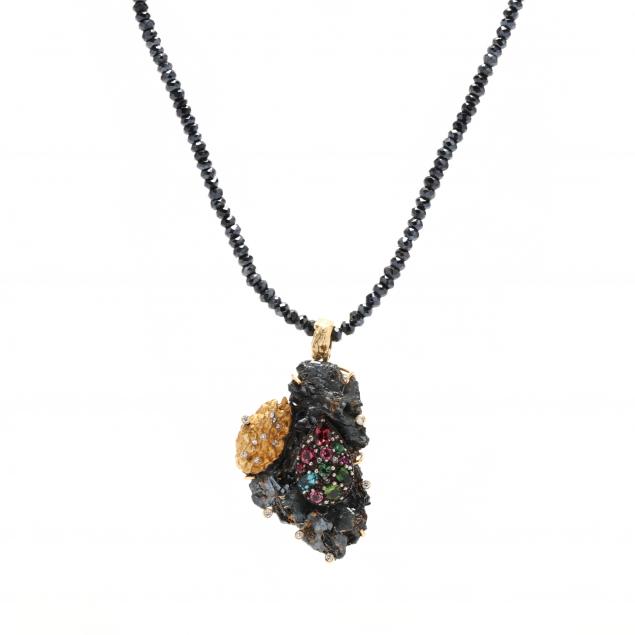 bead-necklace-with-mineral-and-gem-set-pendant