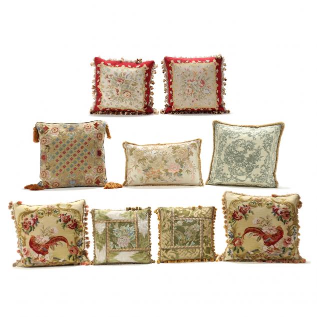 a-grouping-of-nine-decorative-pillows