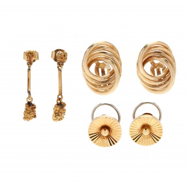 three-pairs-of-gold-earrings