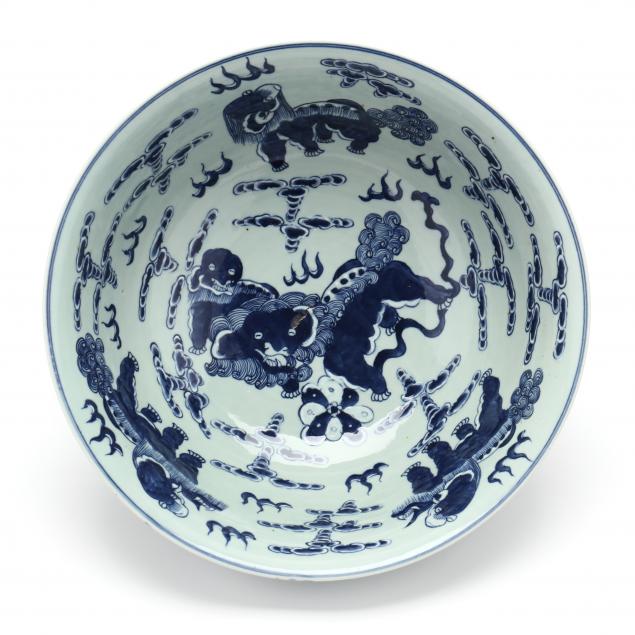 a-chinese-blue-and-white-porcelain-punch-bowl-with-foo-lions