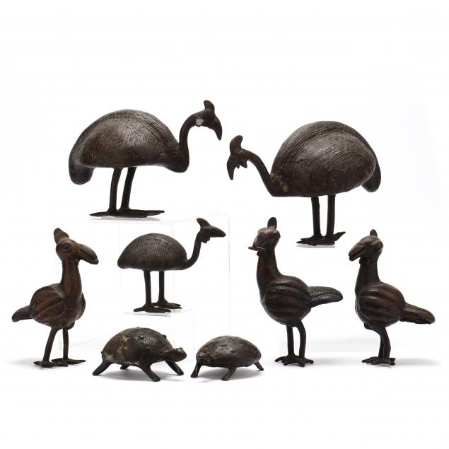 a-grouping-of-eight-african-cast-bronze-animals