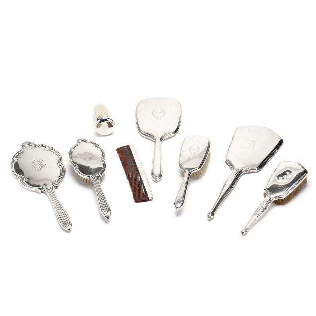 a-grouping-of-eight-american-sterling-silver-vanity-accessories