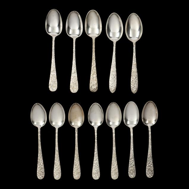 a-grouping-of-twelve-floral-repousse-sterling-silver-teaspoons