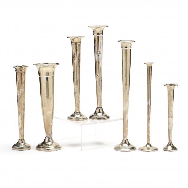 a-grouping-of-seven-american-sterling-silver-bud-vases
